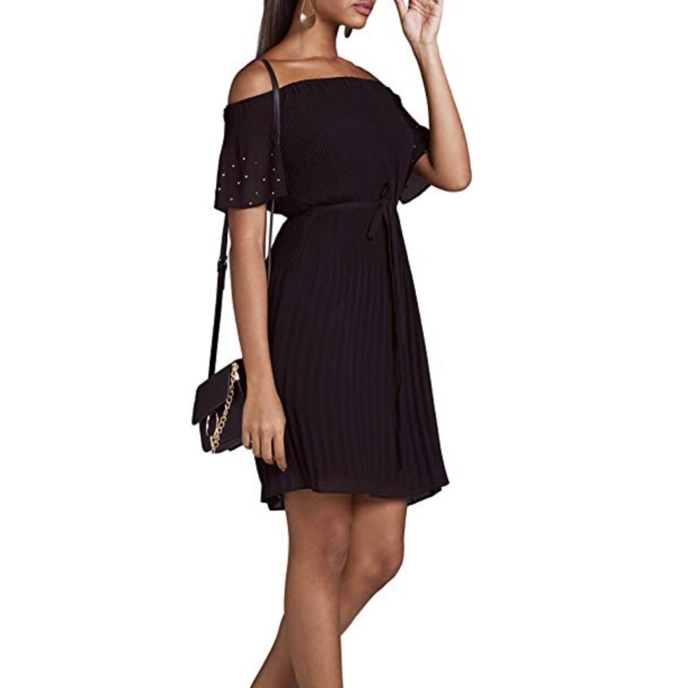 Black bird woman’s dress above the knee